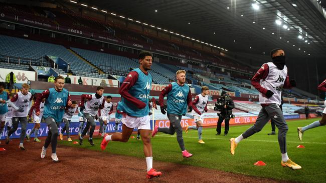 BIRMINGHAM, ENGLAND - JANUARY 08: Callum Rowe of Aston Villa warms up with team mates prior to the FA Cup Third Round match between Aston Villa and Liverpool at Villa Park on January 08, 2021 in Birmingham, England. The match will be played without fans, behind closed doors as a Covid-19 precaution. (Photo by Shaun Botterill/Getty Images)