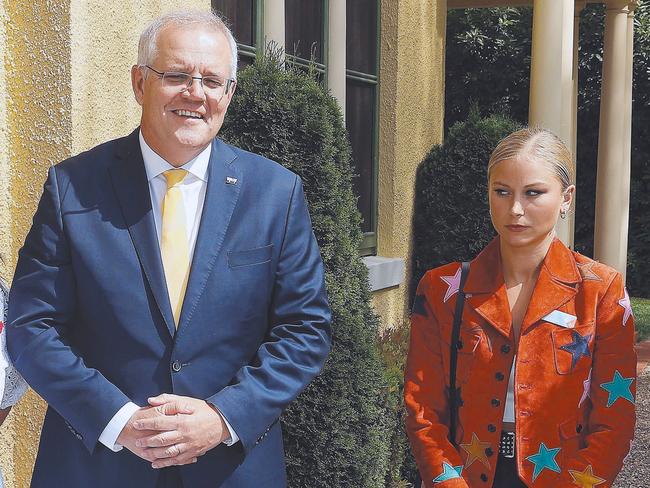 Prime Minister Scott Morrison and his wife Jenny with Grace Tame, who appeared to be uncomfortable with the meeting. Picture: Gary Ramage.