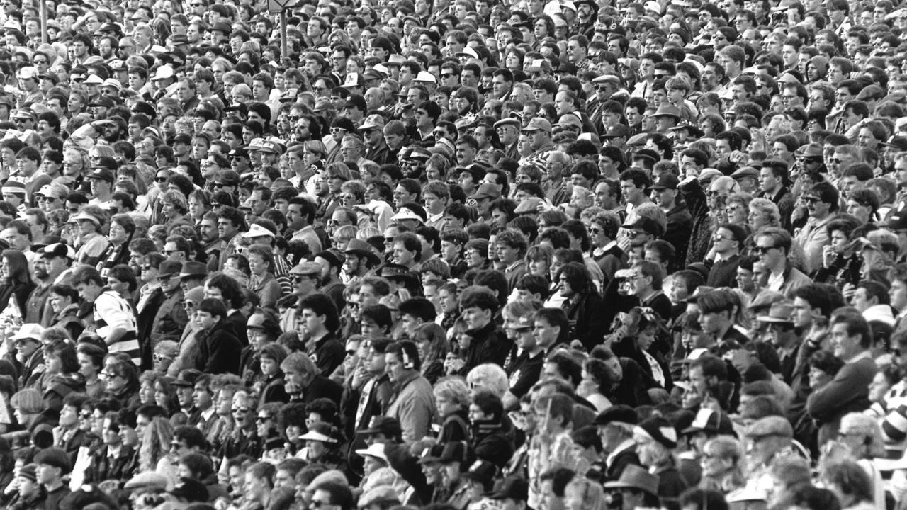 Some of the thousands in the outer at Kardinia Park, Geelong v Essendon. 7/7/1991. Photo: Phillips Stubbs