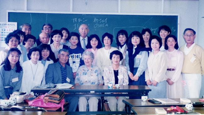 Irene, centre, on one of her trips to Japan to see Tadashi.