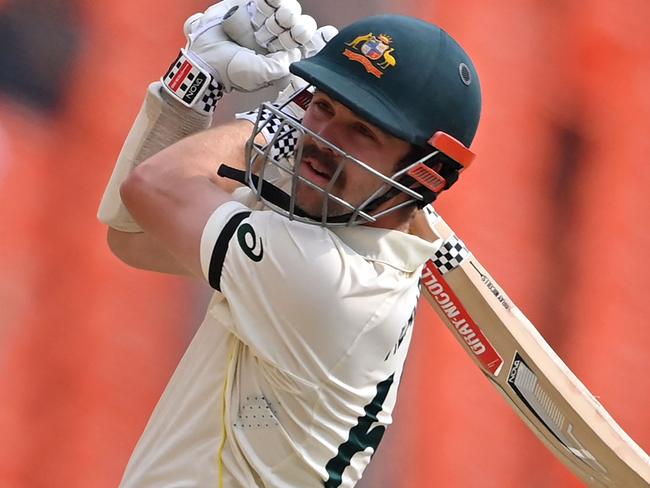 Australia's Travis Head watches the ball after playing a shot during the fifth day of the fourth and final Test cricket match between India and Australia at the Narendra Modi Stadium in Ahmedabad on March 13, 2023. (Photo by Punit PARANJPE / AFP) / ----IMAGE RESTRICTED TO EDITORIAL USE - STRICTLY NO COMMERCIAL USE-----