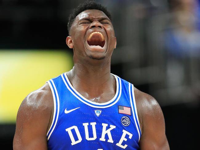 INDIANAPOLIS, IN - NOVEMBER 06: Zion Williamson #1 of the Duke Blue Devils celebrates against the Kentucky Wildcats during the State Farm Champions Classic at Bankers Life Fieldhouse on November 6, 2018 in Indianapolis, Indiana.   Andy Lyons/Getty Images/AFP == FOR NEWSPAPERS, INTERNET, TELCOS & TELEVISION USE ONLY ==