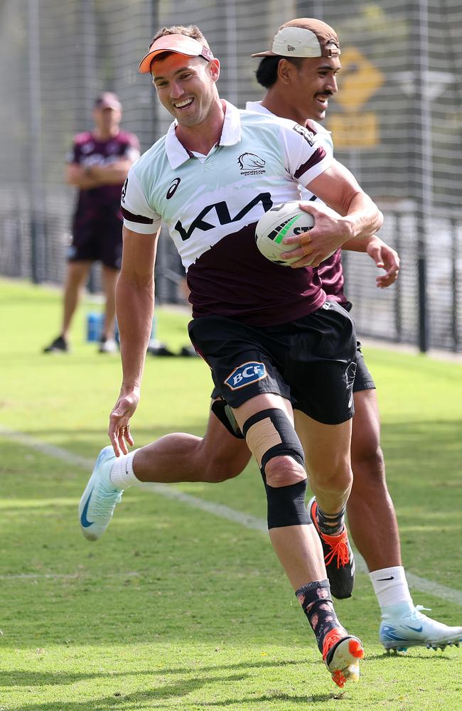 Corey Oates has a laugh at Broncos training in Red Hill. Picture: Liam Kidston