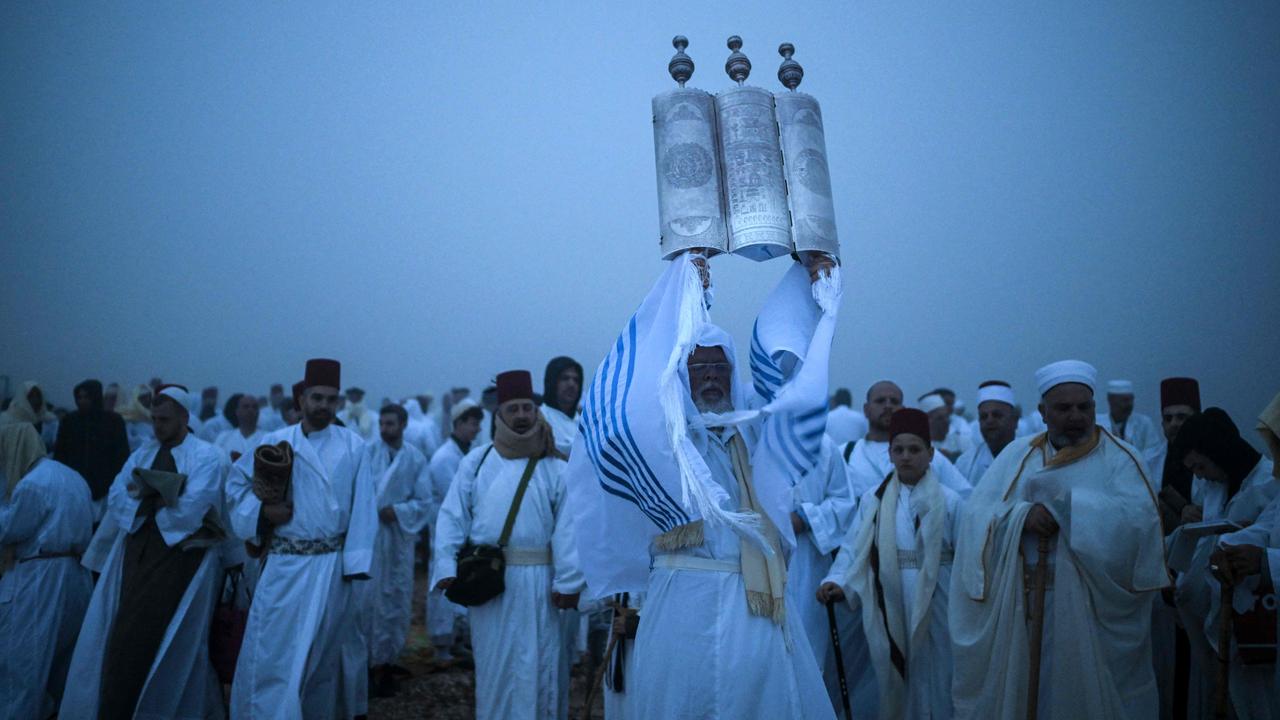 Samaritan worshippers participate in a Passover ceremony atop Mount Gerizim, near Nablus in the northern West Bank, continuing the traditions of their ancient Israelite lineage. Picture: Ronaldo Schemidt/AFP