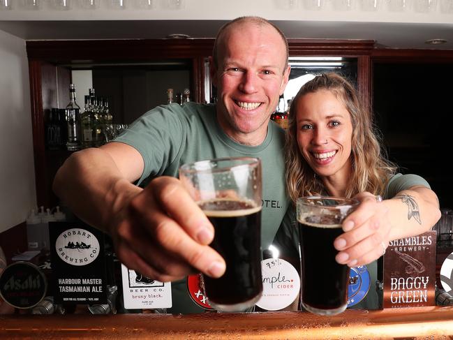 Paul Stewart and Sarah James bar staff at the Crescent Hotel that has re-opened in North Hobart.  Picture: NIKKI DAVIS-JONES