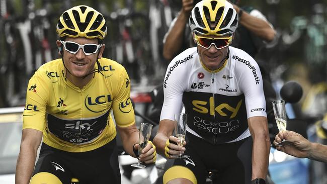 Geraint Thomas and ChristFroome celebrate Tour de France success. (Marco Bertorello, Pool via AP)