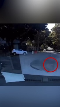 Dashcam footage captures road rage at a roundabout