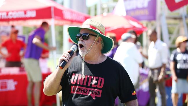 United Workers Union president Heath Mitchell leads a chant for union members at the annual Cairns Labour Day march. Picture: Brendan Radke