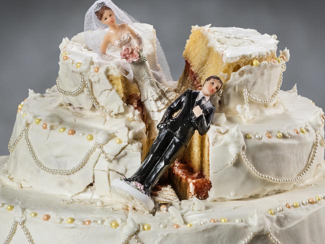 Spouses always seem to struggle to keep their relationship alive. divorce generic wedding cake.