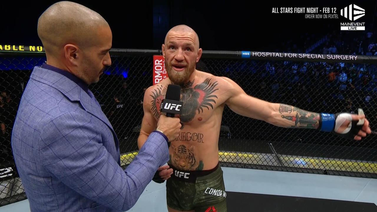 Conor McGregor reacts to his loss to Poirier