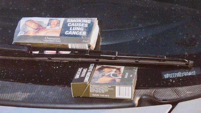 Cigarettes and tobacco at the scene. Picture released by Supreme Court.