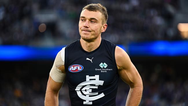 PERTH, AUSTRALIA – APRIL 29: Patrick Cripps of the Blues heads to the coin toss during the 2023 AFL Round 07 match between the West Coast Eagles and the Carlton Blues at Optus Stadium on April 29, 2023 in Perth, Australia. (Photo by Daniel Carson/AFL Photos via Getty Images)