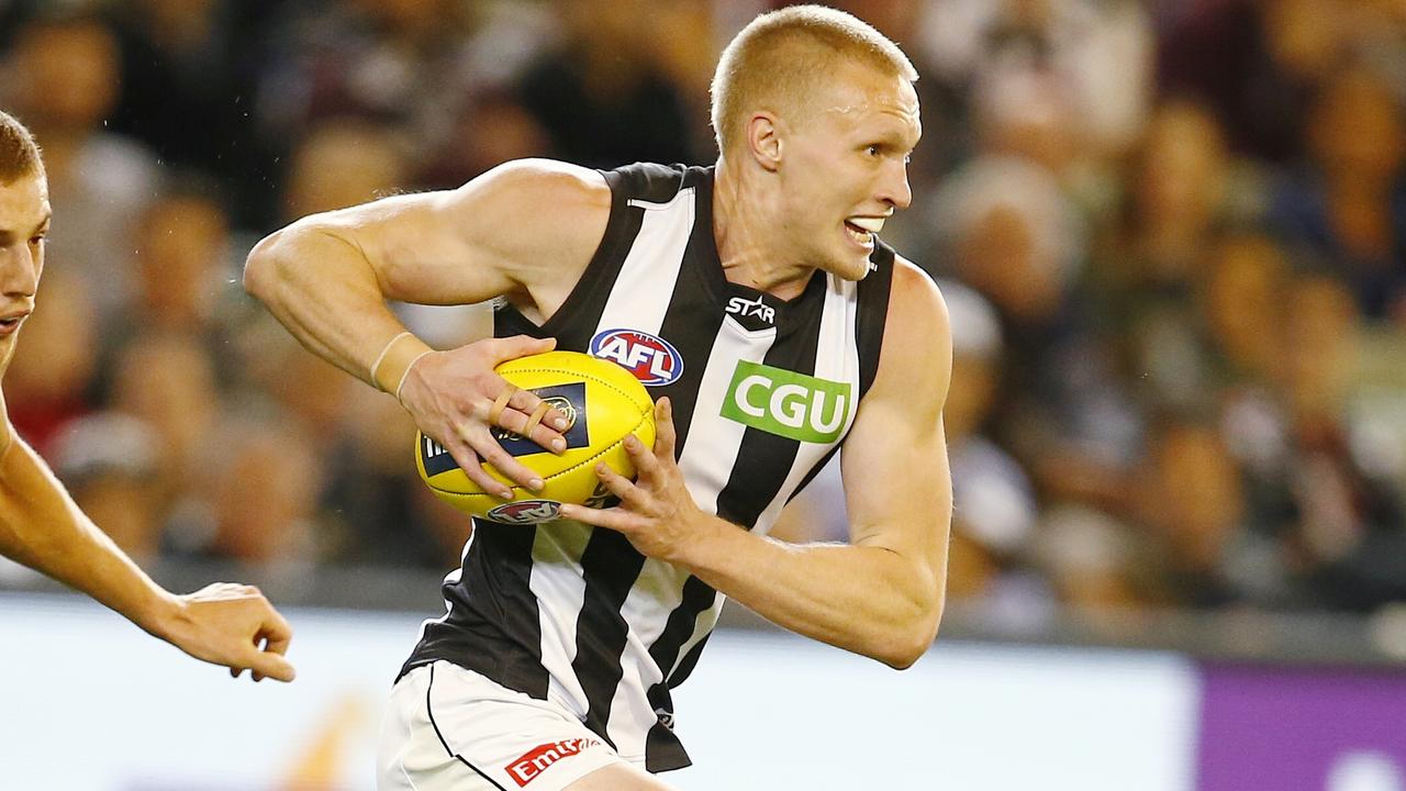 AFL Round 5. Carlton v Collingwood at the MCG. Jack Frost charges out of defence . Pic: Mchael Klein