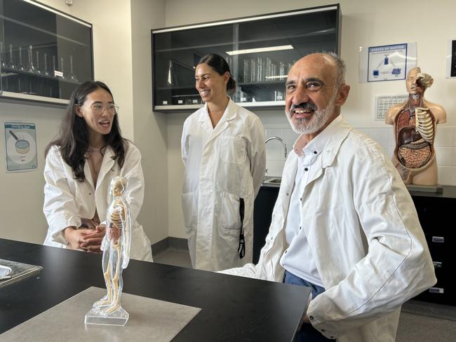 Alexandria Park Community School head of science Rita Khalil (centre) with new hires Sheralyn Franks (left) and Emil Andonov (right) who filled two of 14 vacancies at the school last year. Picture: Supplied