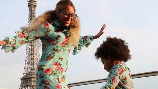 Twinning ... Beyonce and Blue Ivy dance on a rooftop.