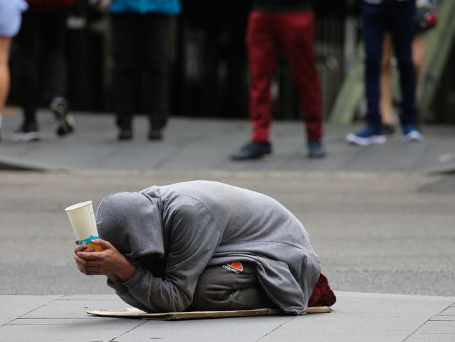 SYDNEY, AUSTRALIA - MARCH 01 2022 - Newswire Photos: The impact of the Covid pandemic has affected our community, people are suffering financial hardship and it has left people vulnerable or homeless as we see people on the streets in the Sydney CBD. Picture: NCA Newswire/ Gaye Gerard