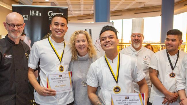 Alessio Nogarotto and Giles Gabutina and with colleagues and peers at Ryde TAFE. Picture: Jordan Shields