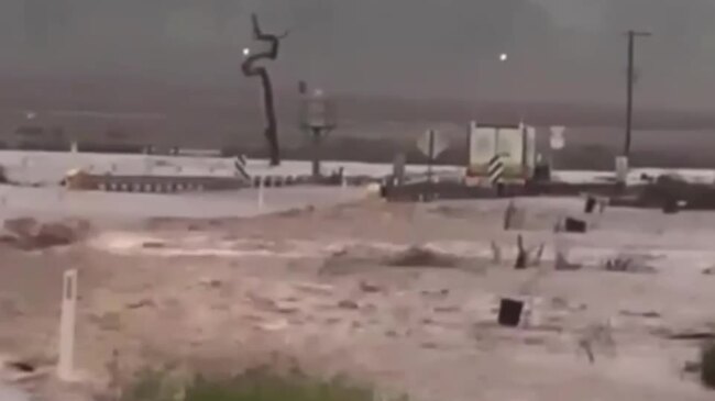 Truck trapped in flood water south of Toowoomba