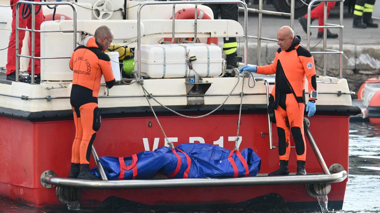 Divers recovered bodies from the doomed superyacht which sunk off the coast of Sicily in a storm. Picture: Alberto Pizzoli / AFP.