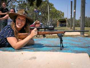 ON TARGET: NewsMail reporter Sarah Steger tries her hand at shooting down at the range. Picture: Brian Cassidy