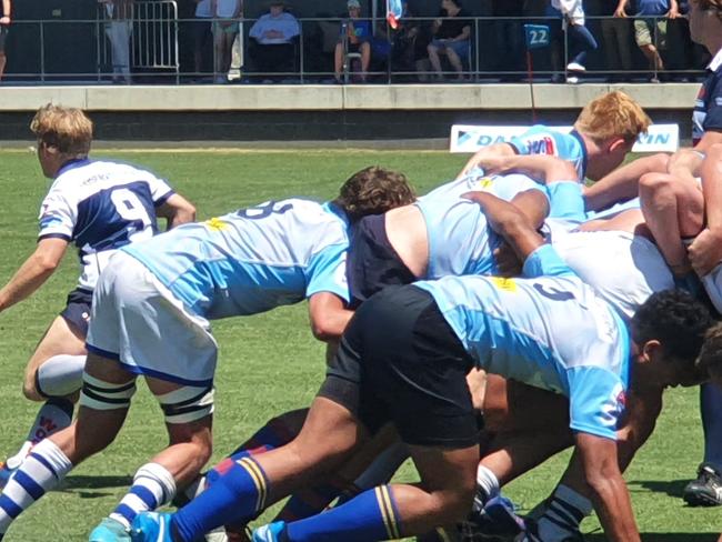 Action in the match between the Gen Blues Junior and a Schools Selection side.