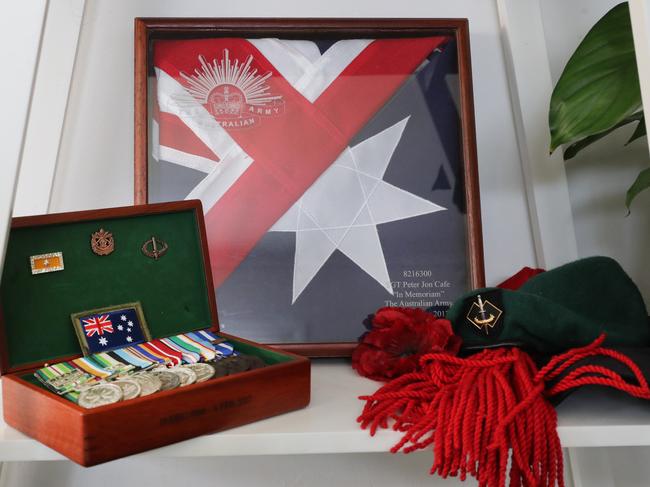 Memorabilia and medals belonging to Pete Cafe who served in Afghanistan and was awarded the Meritorious Unit Citation for his services. Picture: Richard Dobson