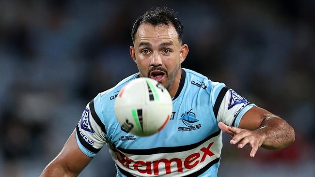 SYDNEY, AUSTRALIA - APRIL 13: Braydon Trindall of the Sharks kicks during the round six NRL match between South Sydney Rabbitohs and Cronulla Sharks at Accor Stadium, on April 13, 2024, in Sydney, Australia. (Photo by Brendon Thorne/Getty Images)