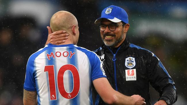 Aaron Mooy of Huddersfield Town and David Wagner.