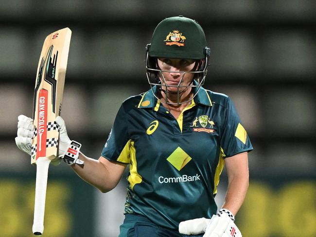 HOBART, AUSTRALIA - JANUARY 30: Beth Mooney of Australia celebrates scoring a half century during game three of the Women's T20 International series between Australia and South Africa at Blundstone Arena on January 30, 2024 in Hobart, Australia. (Photo by Steve Bell/Getty Images)