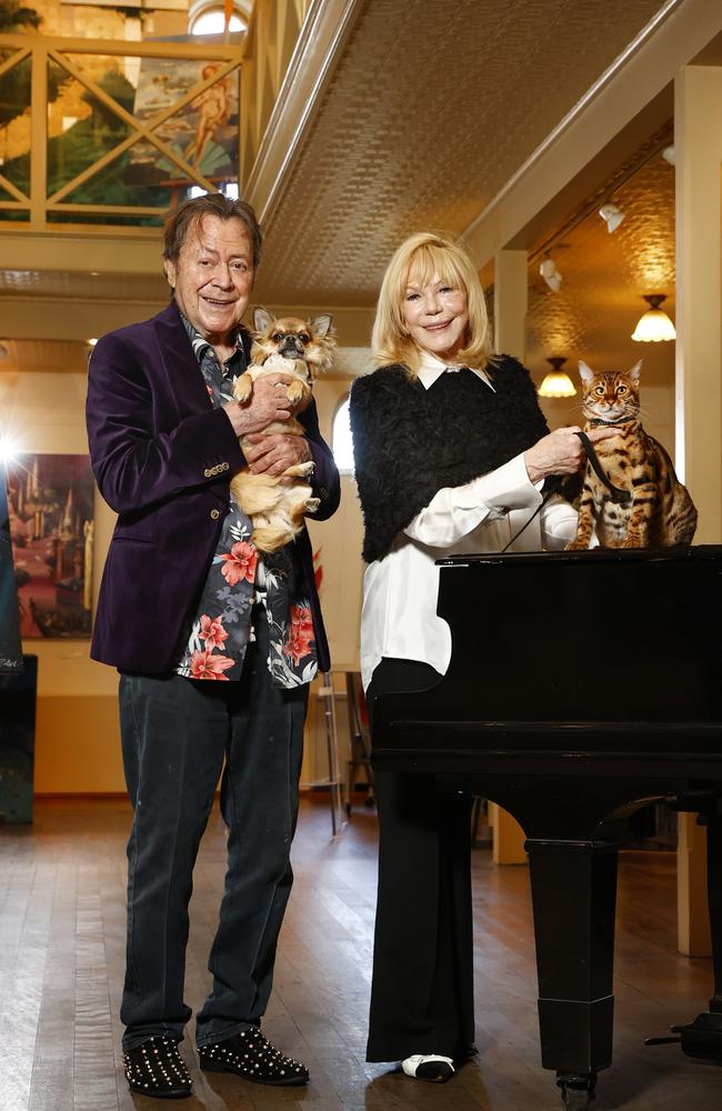 A family portrait of Charles Billich, 89, Christa Billich, 78, and their “children”, Charlie and Ziggy. Picture: Richard Dobson/The Daily Telegraph.