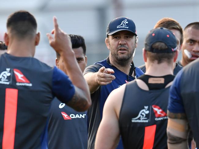 Wallabies coach Michael Cheika (centre) is seen during training at Ballymore in Brisbane, Tuesday, June 5, 2018. The Australian Wallabies are facing Ireland in the first test of a three game series on June 9 at Suncorp Stadium in Brisbane. (AAP Image/Darren England) NO ARCHIVING