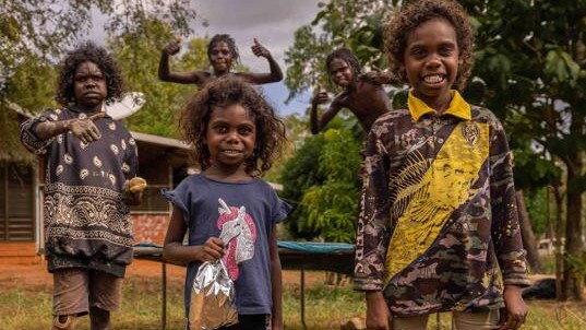 Rhianna, Leerica, Daniel, Shanlee and Anastias Pascoe playing after school on their homelands at Gamardi. Picture: Rebecca Parker