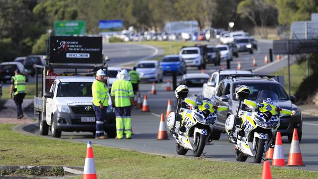 A police road blocks on the M1 at the NSW border. Picture: Scott Powick.