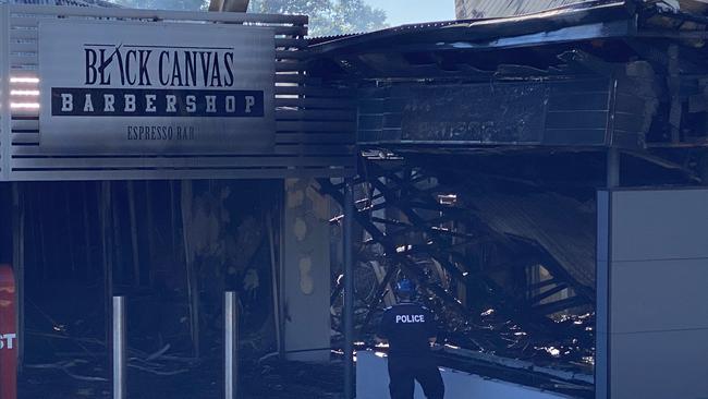 A barber shop was among the businesses damaged in a fire. Picture: Peter Wallis