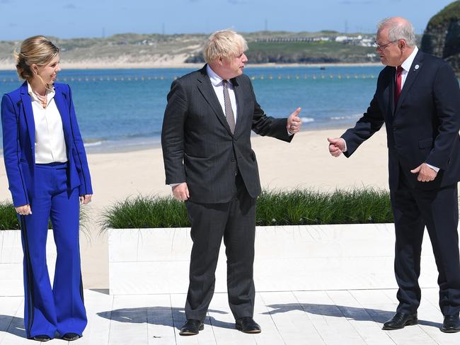 Britain's Prime Minister Boris Johnson and his wife Carrie Johnson speak with Prime Minister Scott Morrison. Picture: Getty Images