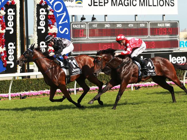 Houtzen crosses the line in the main race. Magic Millions Race Day and Fashions on the Field. Pics Tim Marsden