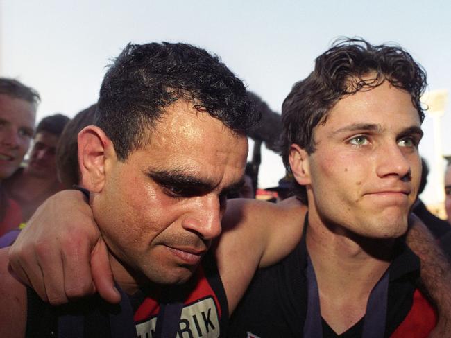 Essendon greats Michael Long and Gavin Wanganeen after their 1993 grand final win.