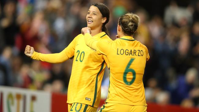 Sam Kerr and Chloe Logarzo of the Matildas celebrate.