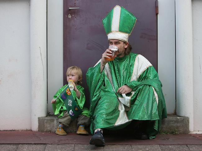 SEPTEMBER 9, 2007: Irish supporter Kevin Keaney from Brighton and his daughter Kathleen Rose (3 ), enjoying a beer and a bottle of milk respectively, before the Ireland v Namibia World Cup (RWC) Group D match at the Chaban Delmas Stadium, Bordeaux, France, 09/09/07.Rugby Union / Fan