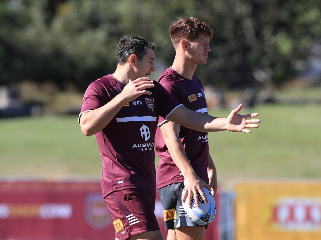 Billy Slater, pictured talking to Kalyn Ponga, has experience working within the Maroons camp as an assistant coach. Picture: Adam Head