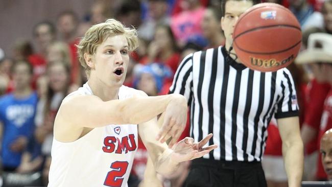 Tom Wilson dishes a pass while playing for SMU. Photo: SMU Basketball.