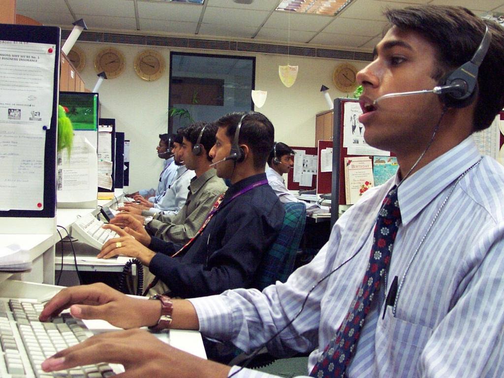 Workers at a call centre in Delhi. Picture: Greg Stitt