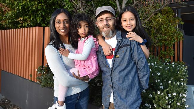 Sean McBride and his wife Jaya and two daughters Kara, 7 and Meera, 3, are about to list their penthouse style home at 307/19 Hall St, Cheltenham to move closer to family. He said he "can't fault" the family-friendly area, thanks to it's parks and beaches nearby that they enjoyed especially during lockdown. Picture : Nicki Connolly