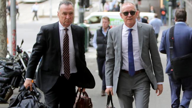 Craig Emerson and Jay Weatherill arrive for the ALP National executive meeting to receive the ALP review, in Melbourne. Picture: Stuart McEvoy.