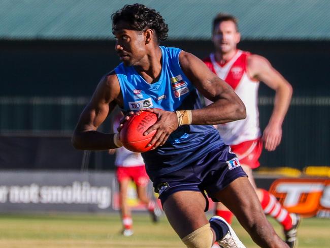 Rovers' Tosh Kunoth sets his sights on the goals on the way to booting six against Federal on Saturday. Picture: Charlie Rowson