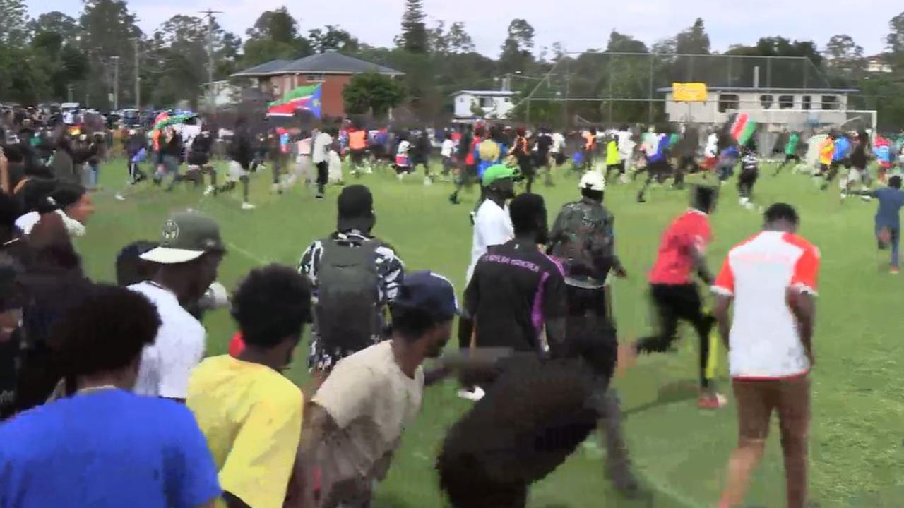 A large crowd of supporters could be seen flooding the field to celebrate after the AFCON final match at Goodna's Western Spirit Football Club on December 10. Picture: AFCON Live