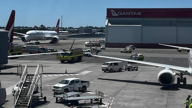 Emergency services on the tarmac at Sydney Airport after Qantas flight drama