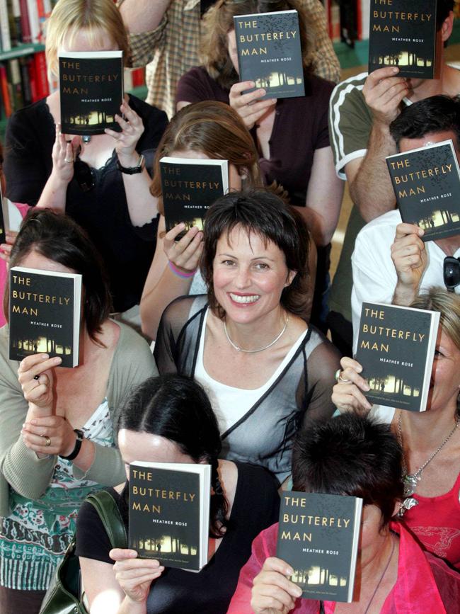 Heather Rose surrounded by fans at the launch of The Butterfly Man at Fullers Bookshop in 2005. Picture: Kim Eiszele