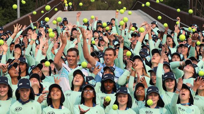 Tennis doubles players Bob and Mike Bryan pose for a photo with the 2020 Australian Open ball kids during the official welcome of the Australian Open ball kids in Melbourne on January 13, 2020. Picture: AAP Image and David Crosling