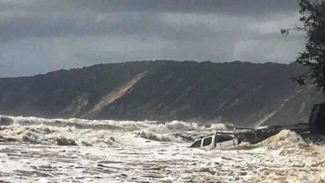 A driver this morning gambled and lost attempting to go round the Mudlo Rocks at Rainbow Beach just before high tide. Rainbow Beach Towing